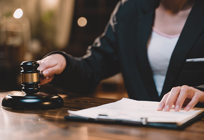 Legal professional with gavel document